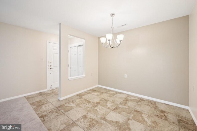 23 Village Ln Building 3 # 23A, Mount Laurel, NJ 08054 - empty room featuring a chandelier and baseboards