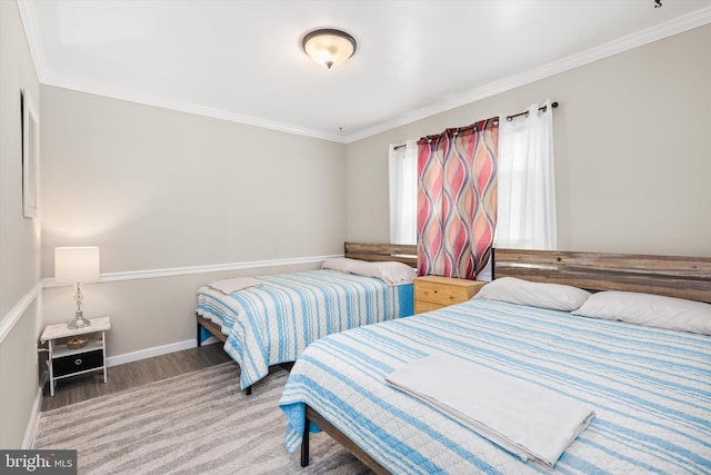 1004 Philadelphia Ave, Ocean City, MD 21842 - bedroom featuring ornamental molding, wood finished floors, and baseboards