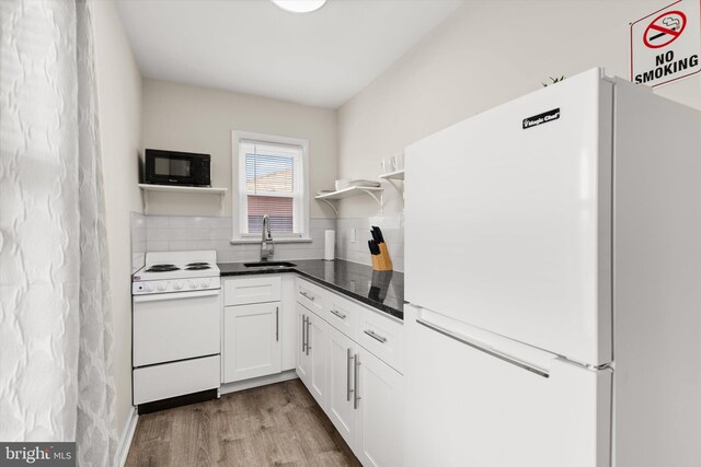 1004 Philadelphia Ave, Ocean City, MD 21842 - kitchen featuring white appliances, a sink, open shelves, backsplash, and white cabinetry