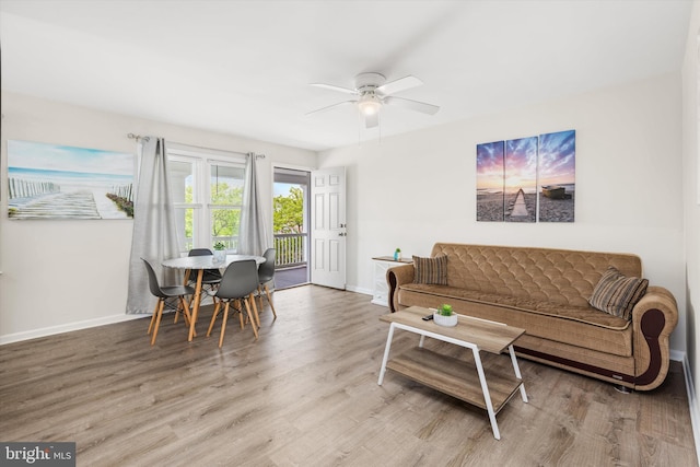 1004 Philadelphia Ave, Ocean City, MD 21842 - living room featuring baseboards, wood finished floors, and ceiling fan
