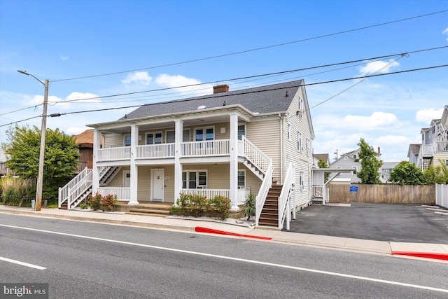 1004 Philadelphia Ave, Ocean City, MD 21842 - multi unit property with stairs, covered porch, and fence