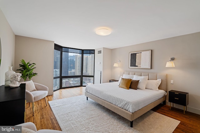 2018 Walnut St Unit 19Gh, Philadelphia, PA 19103 - bedroom with floor to ceiling windows and wood finished floors