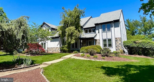 52 Dalton Way, Southampton, PA 18966 - view of front of house featuring stone siding, a front yard, and a shingled roof