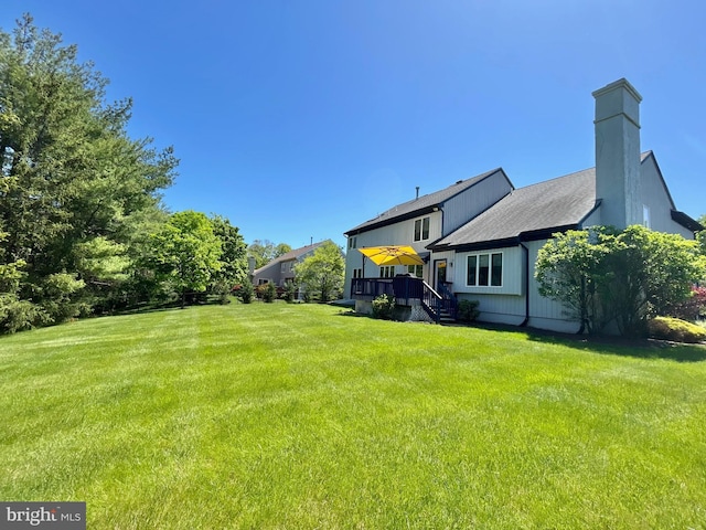 52 Dalton Way, Southampton, PA 18966 - view of green lawn featuring a deck
