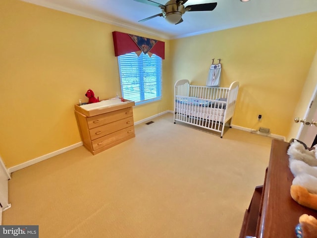 52 Dalton Way, Southampton, PA 18966 - carpeted bedroom with a nursery area, ornamental molding, baseboards, and ceiling fan