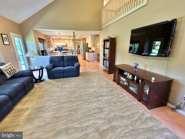 52 Dalton Way, Southampton, PA 18966 - living area with a chandelier and high vaulted ceiling