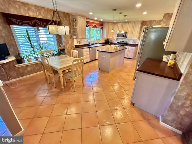 52 Dalton Way, Southampton, PA 18966 - kitchen featuring dark countertops, appliances with stainless steel finishes, a center island, a sink, and recessed lighting