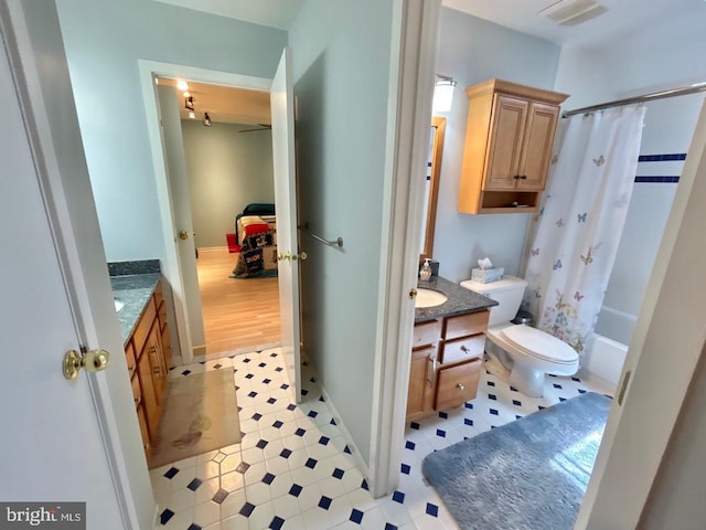 52 Dalton Way, Southampton, PA 18966 - bathroom featuring vanity, toilet, and shower / bath combo with shower curtain