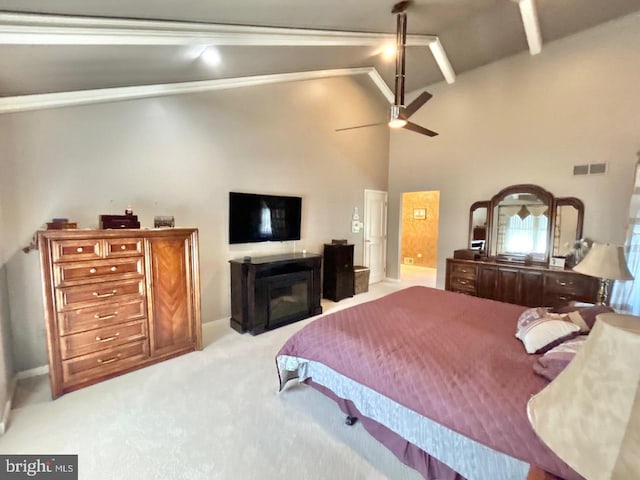 52 Dalton Way, Southampton, PA 18966 - bedroom featuring light colored carpet, a glass covered fireplace, beam ceiling, ceiling fan, and high vaulted ceiling
