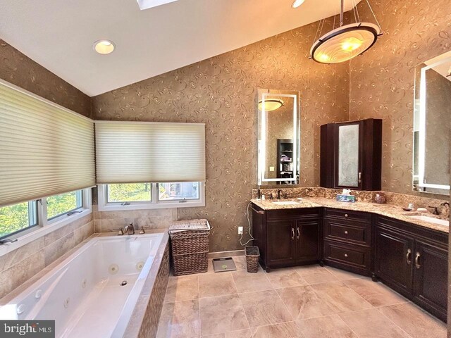 52 Dalton Way, Southampton, PA 18966 - bathroom with lofted ceiling, a whirlpool tub, wallpapered walls, double vanity, and recessed lighting