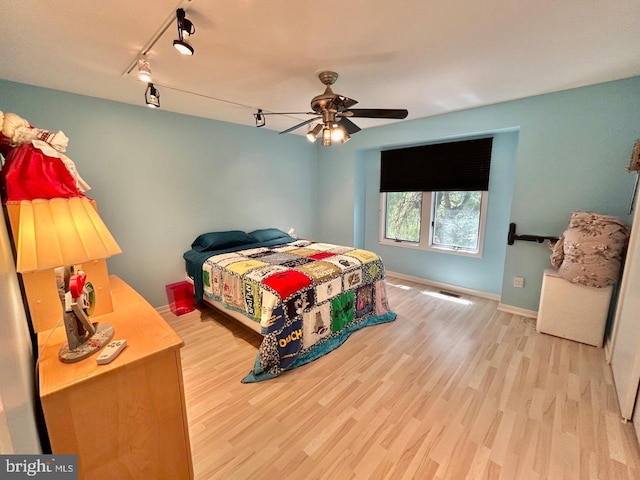 52 Dalton Way, Southampton, PA 18966 - bedroom featuring wood finished floors, baseboards, and rail lighting