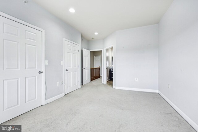 42397 Goldenseal Sq, Brambleton, VA 20148 - unfurnished bedroom with carpet flooring, baseboards, and recessed lighting