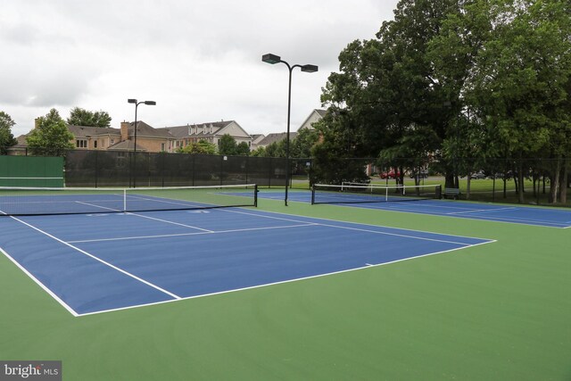 42397 Goldenseal Sq, Brambleton, VA 20148 - view of tennis court featuring community basketball court and fence