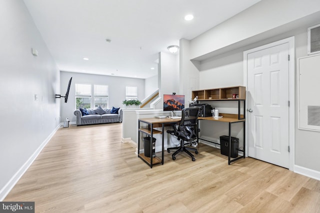 42397 Goldenseal Sq, Brambleton, VA 20148 - home office with light wood-style flooring, baseboards, recessed lighting, and a baseboard heating unit