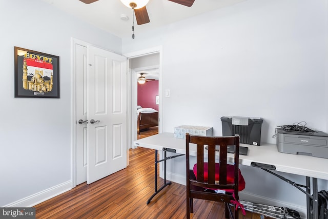 home office with ceiling fan, wood finished floors, and baseboards