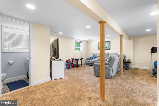 below grade area featuring carpet flooring, baseboards, and recessed lighting