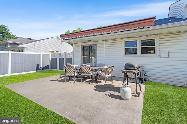 view of patio / terrace featuring area for grilling and outdoor dining area