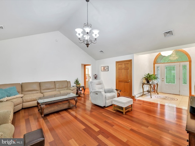 773 S Rte 183, Schuylkill Haven, PA 17972 - living area with a chandelier, wood finished floors, and high vaulted ceiling