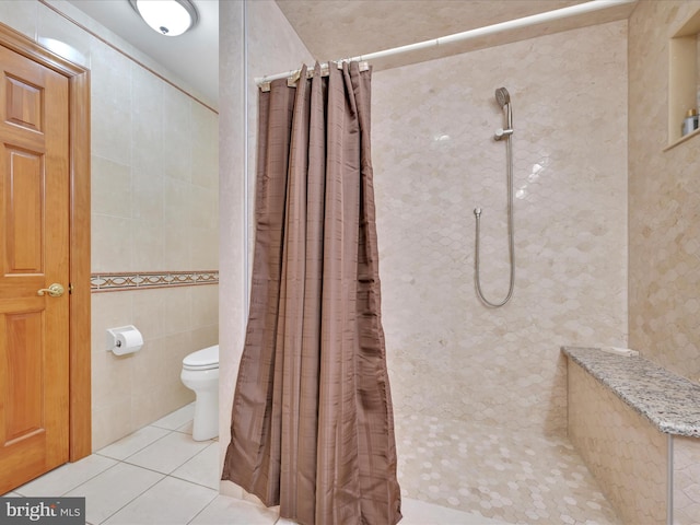 773 S Rte 183, Schuylkill Haven, PA 17972 - full bath with tile patterned floors, a tile shower, toilet, and tile walls