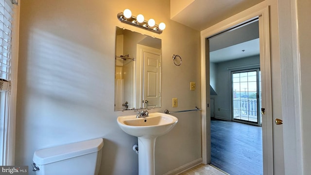 208 Eastern Ave, Annapolis, MD 21403 - half bathroom featuring toilet and baseboards