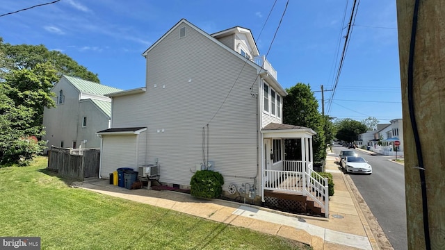 208 Eastern Ave, Annapolis, MD 21403 - back of property featuring a lawn and crawl space