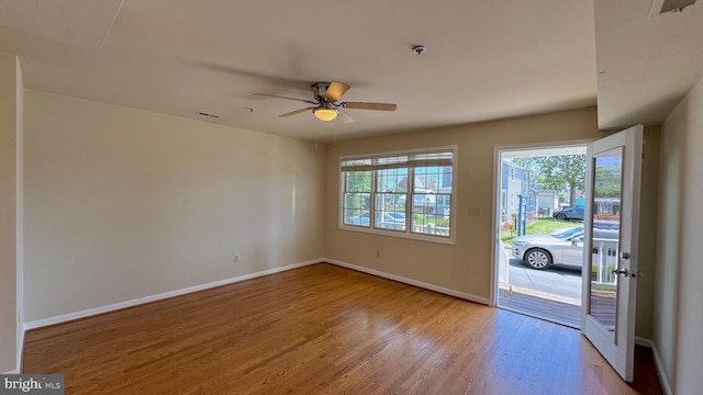 208 Eastern Ave, Annapolis, MD 21403 - spare room with wood finished floors, baseboards, a ceiling fan, and a pendent fire sprinkler