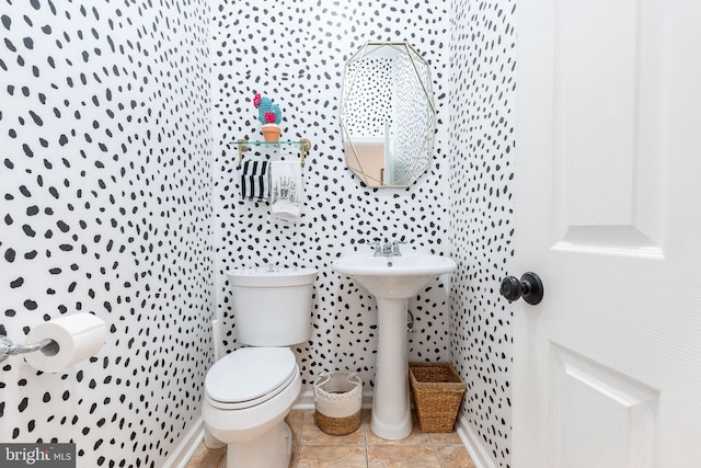 2113 Montrose St, Philadelphia, PA 19146 - bathroom with toilet, tile patterned flooring, and a sink