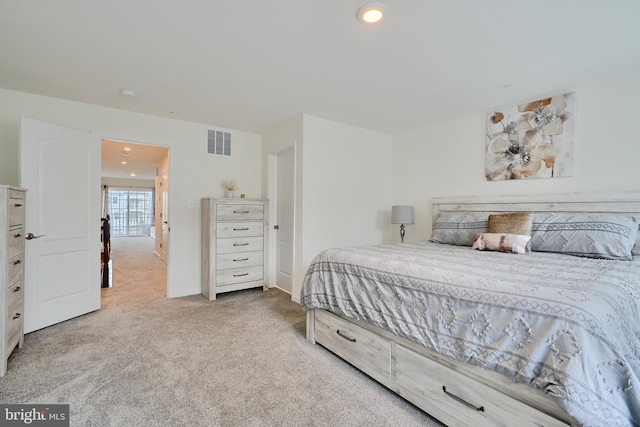 bedroom with carpet floors and recessed lighting