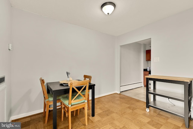 1245 4th St SW Unit E511, Washington, DC 20024 - dining area with baseboard heating and baseboards