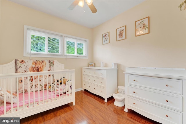 bedroom featuring wood finished floors