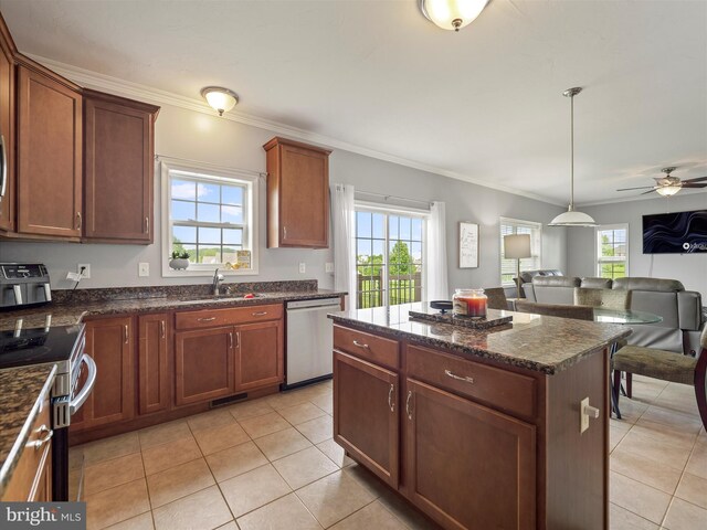 67 Tinning Ct, Hedgesville, WV 25427 - kitchen with appliances with stainless steel finishes, open floor plan, light tile patterned floors, a sink, and crown molding