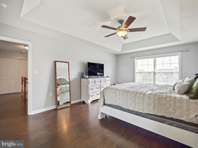 67 Tinning Ct, Hedgesville, WV 25427 - bedroom featuring a raised ceiling, dark wood finished floors, baseboards, and a ceiling fan