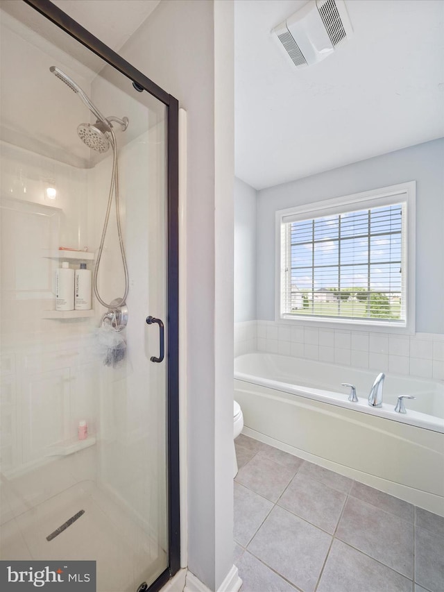 67 Tinning Ct, Hedgesville, WV 25427 - bathroom with a stall shower, tile patterned floors, toilet, and a garden tub