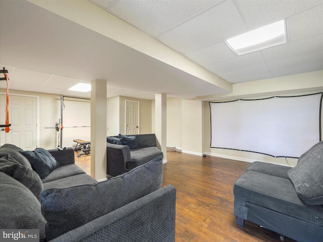 67 Tinning Ct, Hedgesville, WV 25427 - cinema room featuring a paneled ceiling, wood finished floors, and baseboards