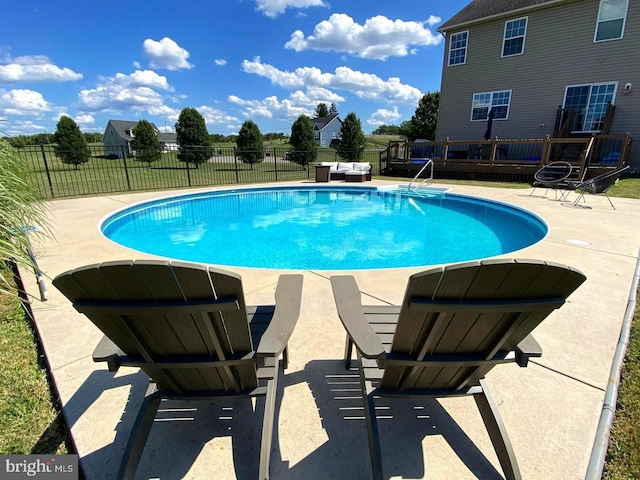 67 Tinning Ct, Hedgesville, WV 25427 - view of pool featuring fence, a wooden deck, and a patio