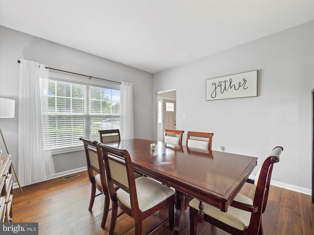 67 Tinning Ct, Hedgesville, WV 25427 - dining room with baseboards and wood finished floors