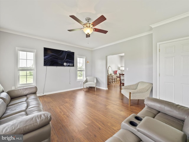 67 Tinning Ct, Hedgesville, WV 25427 - living area with crown molding, wood finished floors, ceiling fan, and baseboards