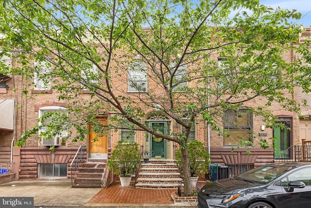 view of front of property with brick siding