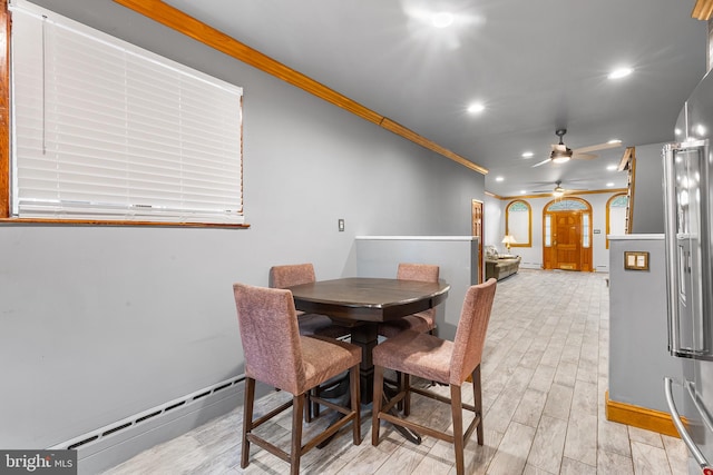 dining space featuring a baseboard heating unit, recessed lighting, ceiling fan, light wood-style flooring, and ornamental molding