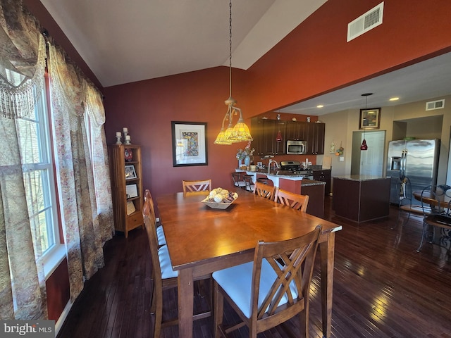 85 Malek Dr, Hanover, PA 17331 - dining area featuring dark wood finished floors and lofted ceiling