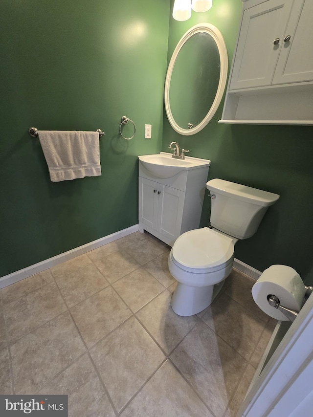 85 Malek Dr, Hanover, PA 17331 - bathroom with baseboards, vanity, tile patterned flooring, and toilet