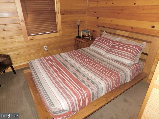 158 Hideaway Ln, Upper Tract, WV 26866 - bedroom featuring wood walls and carpet