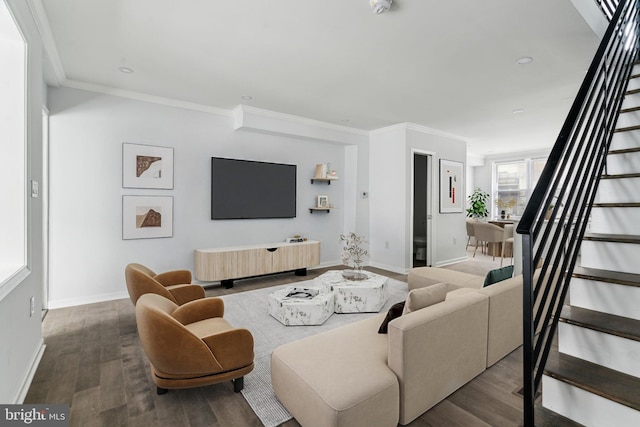 living room with stairway, baseboards, wood finished floors, crown molding, and recessed lighting