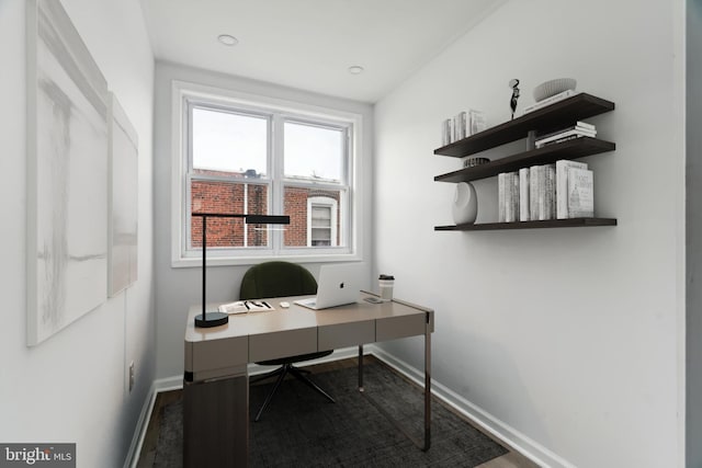 office space featuring baseboards