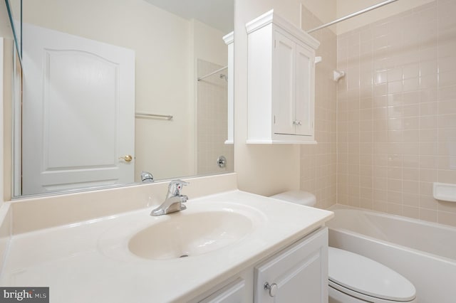 full bathroom with toilet, vanity, and shower / tub combination