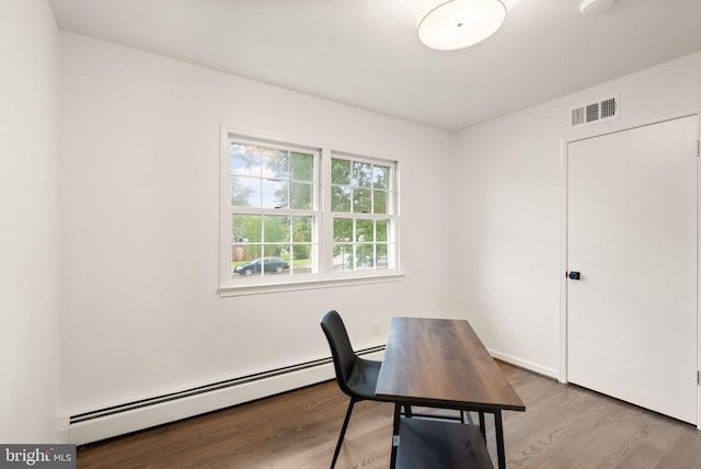 5632 Maxine Ct, Alexandria, VA 22310 - office space with a baseboard heating unit and wood finished floors