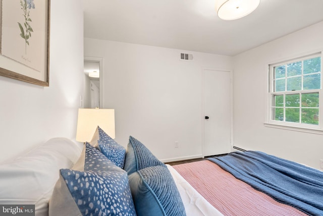 5632 Maxine Ct, Alexandria, VA 22310 - bedroom featuring baseboards and wood finished floors