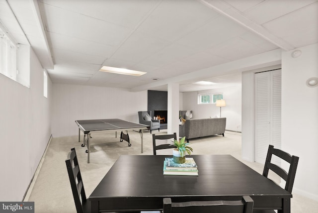 5632 Maxine Ct, Alexandria, VA 22310 - dining space with a large fireplace, baseboards, and light carpet
