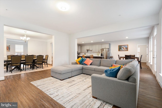 living room featuring a chandelier, dark wood-style floors, recessed lighting, and baseboards