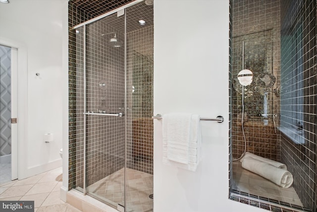 302 Ellsworth Dr, Silver Spring, MD 20910 - bathroom featuring a shower stall, tile patterned flooring, and toilet